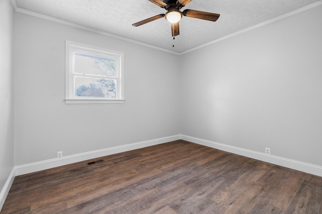 985 Watauga Dr, Cookeville, TN 38501 - empty room with ceiling fan, ornamental molding, dark hardwood / wood-style floors, and a textured ceiling
