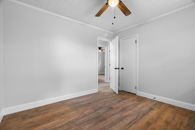 985 Watauga Dr, Cookeville, TN 38501 - spare room with ceiling fan, hardwood / wood-style floors, crown molding, and a textured ceiling