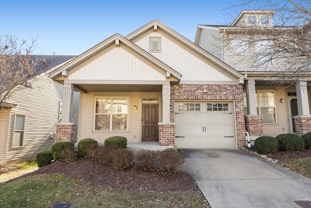 view of front of home featuring a porch and a garage