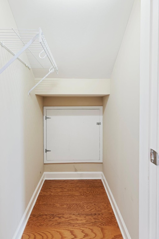 spacious closet featuring hardwood / wood-style floors