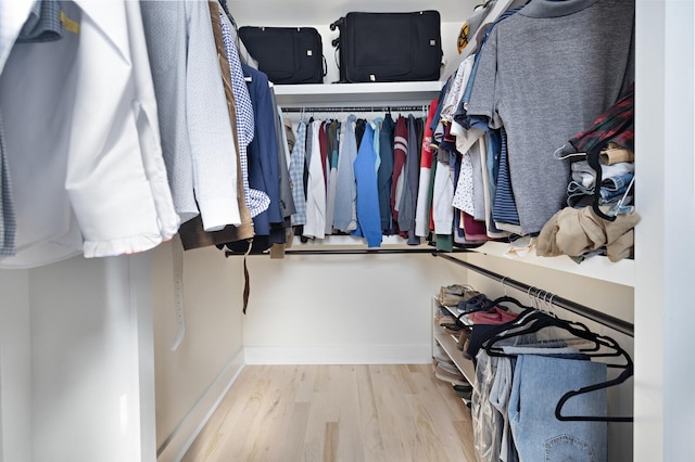 walk in closet featuring light wood-type flooring