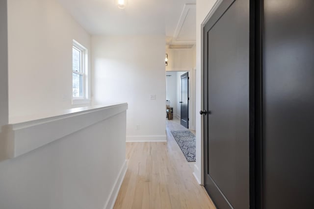 corridor with light wood-type flooring