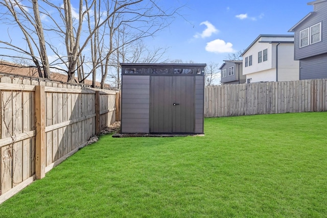 view of outbuilding with a yard