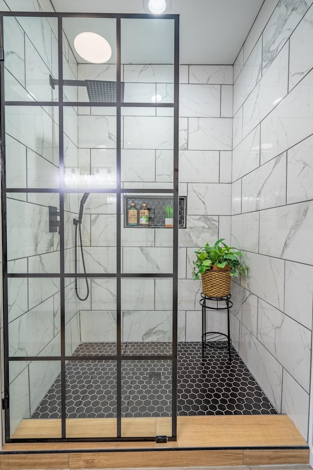 interior space featuring tiled shower