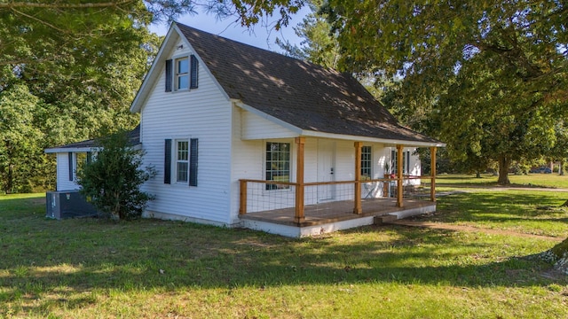 exterior space featuring a yard and covered porch