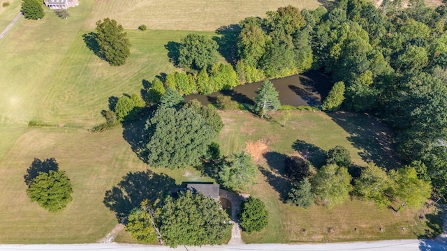 birds eye view of property featuring a rural view