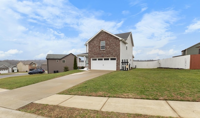 front facade with a garage and a front lawn