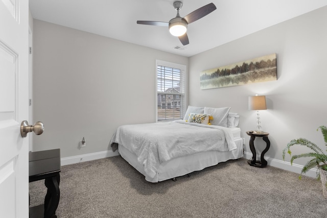 bedroom featuring ceiling fan and carpet