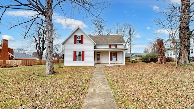 view of front facade featuring a porch and a front lawn