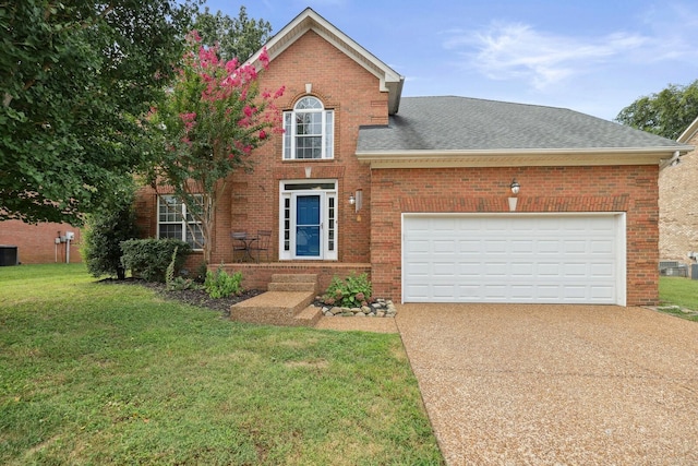 view of front of house with a garage and a front yard