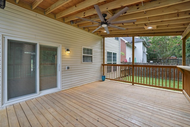 wooden terrace featuring ceiling fan