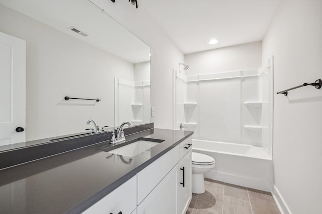 full bathroom featuring toilet, bathtub / shower combination, tile patterned floors, and vanity