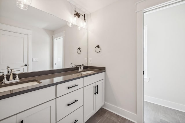 bathroom featuring tile patterned floors and vanity