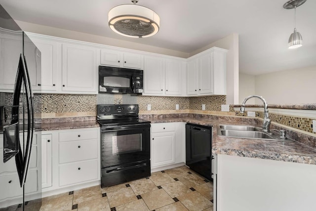 kitchen with black appliances, tasteful backsplash, white cabinetry, sink, and decorative light fixtures