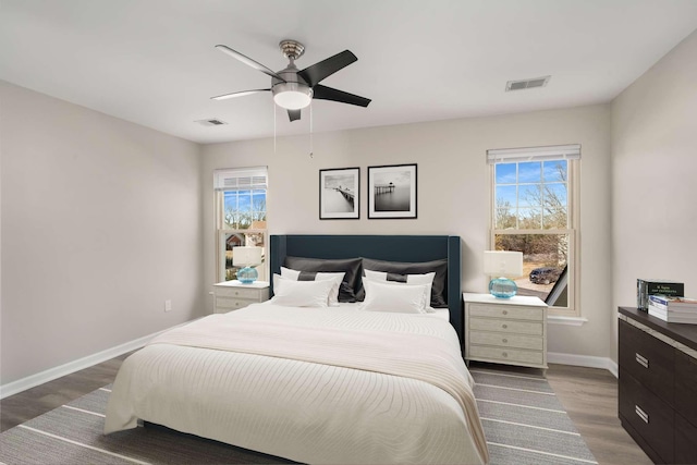 bedroom featuring ceiling fan and hardwood / wood-style flooring