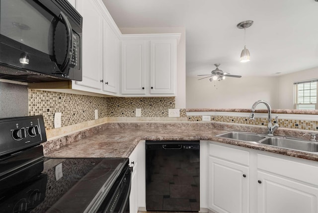 kitchen with black appliances, backsplash, white cabinetry, and sink