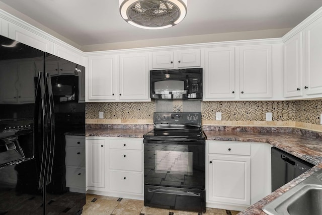 kitchen with black appliances, white cabinetry, and decorative backsplash