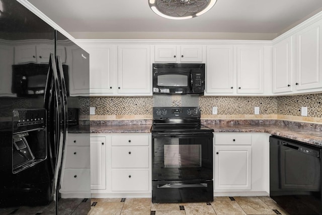 kitchen with backsplash, white cabinets, black appliances, and dark stone countertops