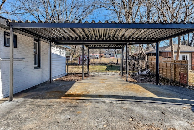 view of parking / parking lot with a carport