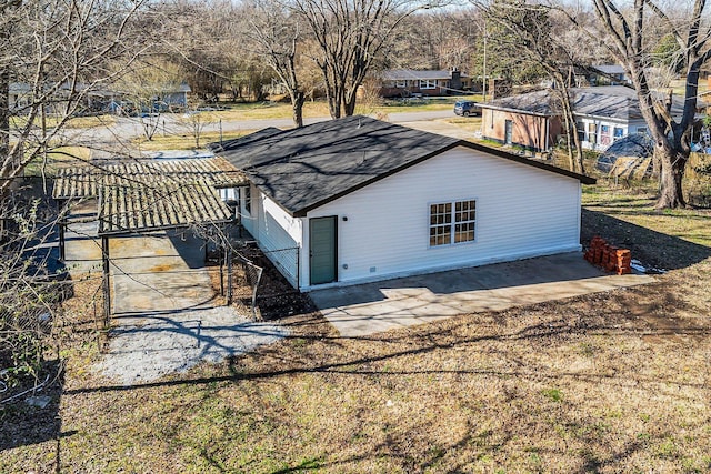 back of house with a patio