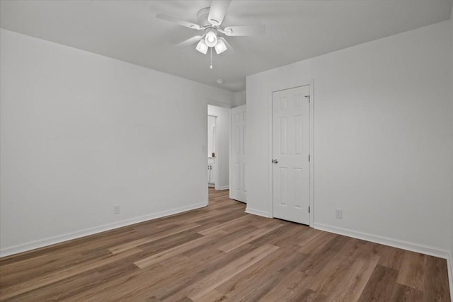 unfurnished bedroom with light wood-type flooring and ceiling fan