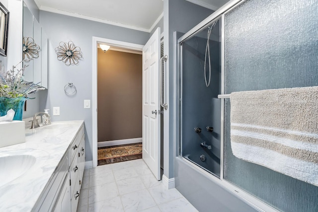 bathroom with ornamental molding, combined bath / shower with glass door, and vanity