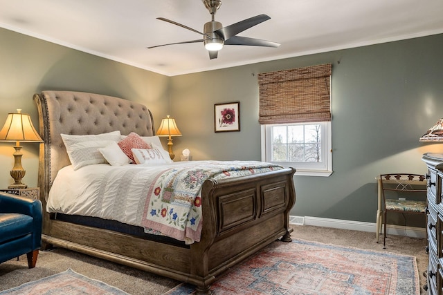 bedroom featuring ceiling fan, ornamental molding, and carpet floors