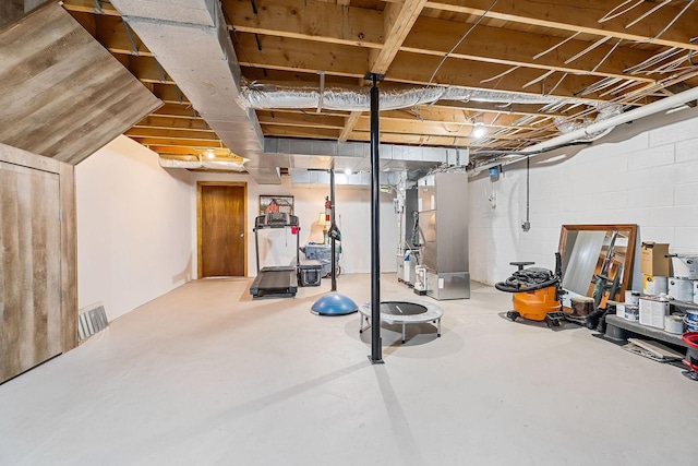 basement featuring heating unit