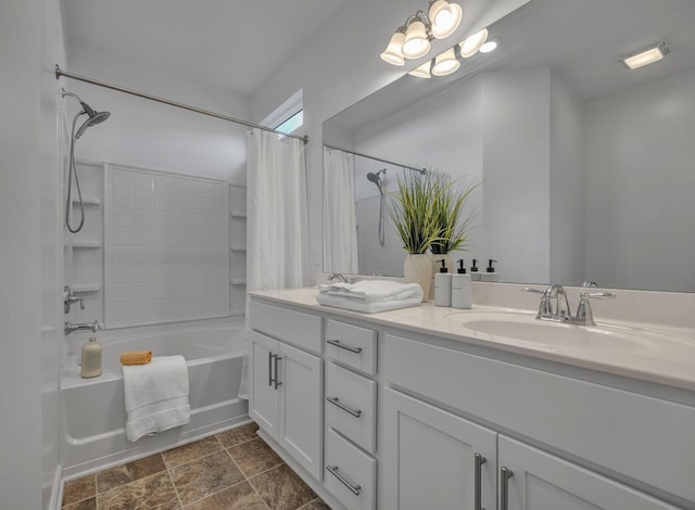 bathroom with vanity and shower / bath combo