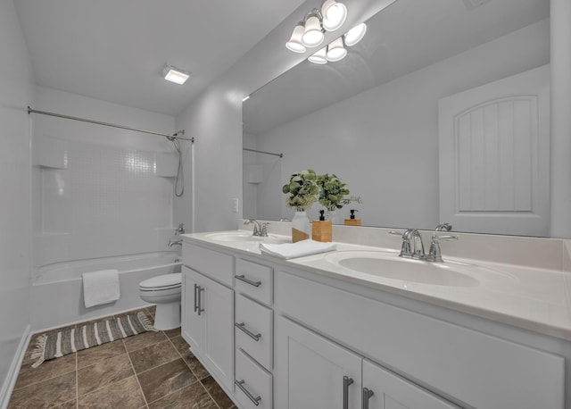 full bathroom with washtub / shower combination, vanity, and toilet