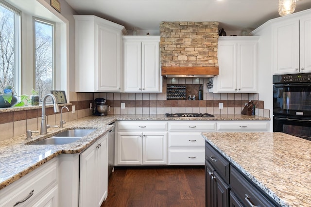 kitchen featuring sink, white cabinets, and appliances with stainless steel finishes