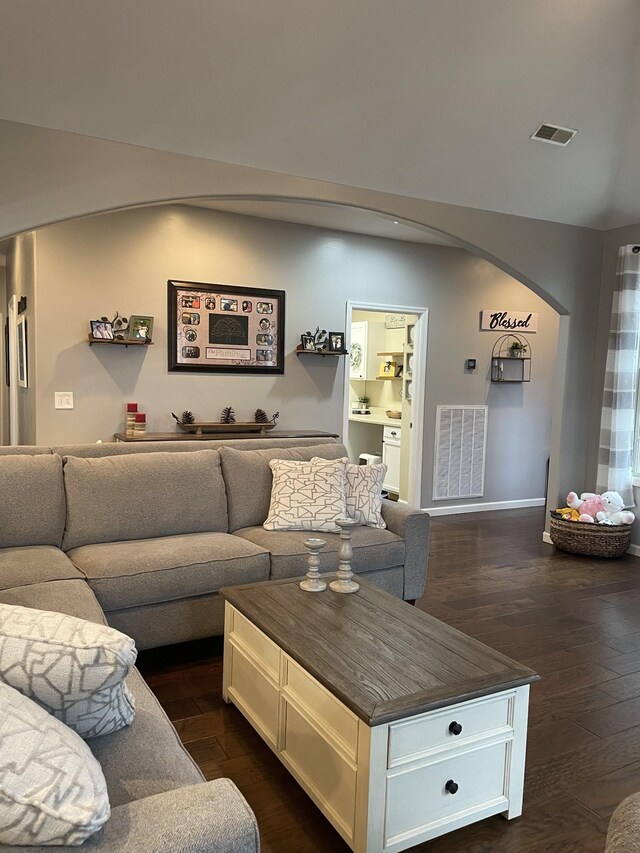 living room with dark hardwood / wood-style floors