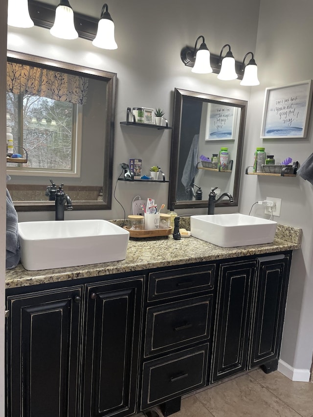 bathroom featuring vanity and tile patterned flooring