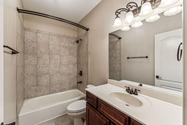 full bathroom with tiled shower / bath combo, vanity, toilet, and tile patterned flooring