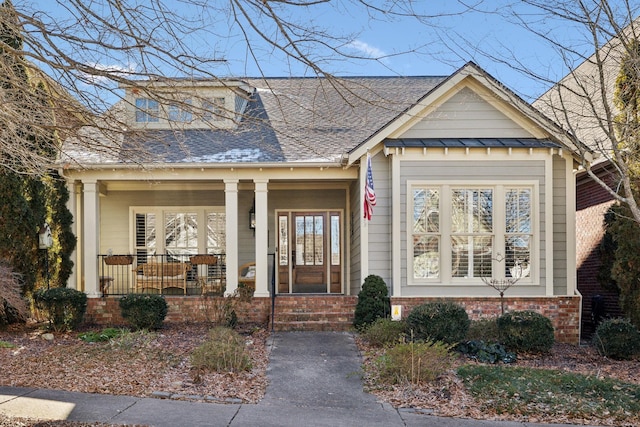 view of front of property featuring covered porch