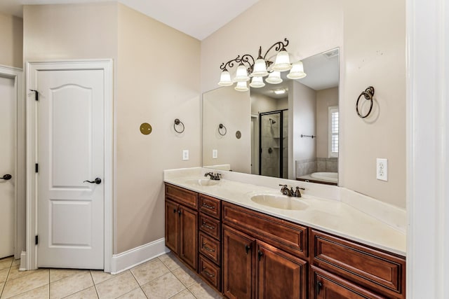 bathroom with vanity, shower with separate bathtub, and tile patterned flooring