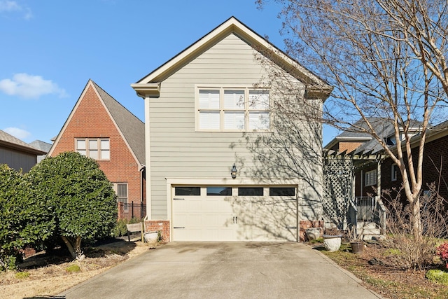 view of front of home with a garage