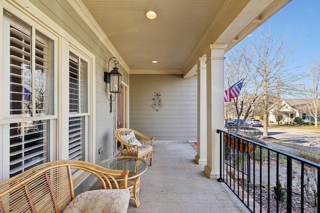 balcony featuring a porch