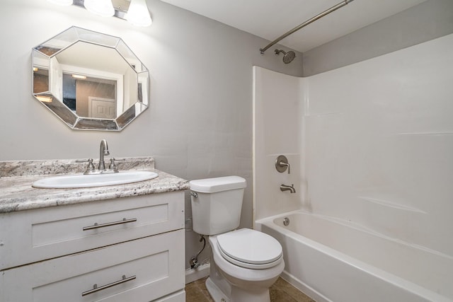 full bathroom with vanity, toilet, and washtub / shower combination