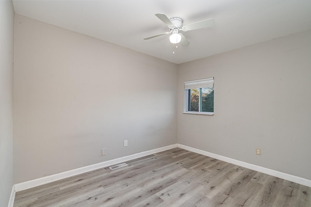 unfurnished room featuring ceiling fan and light hardwood / wood-style floors