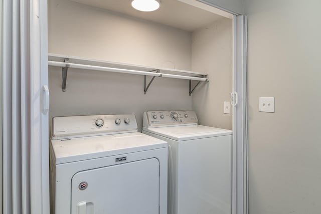 laundry area with washer and clothes dryer