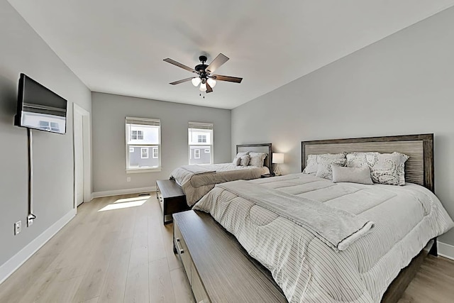 bedroom featuring ceiling fan and light wood-type flooring