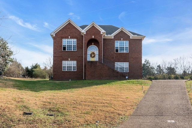 front of property featuring a front lawn