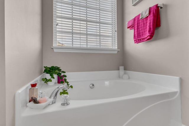 bathroom featuring a tub