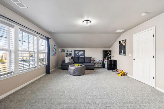 carpeted living room with lofted ceiling