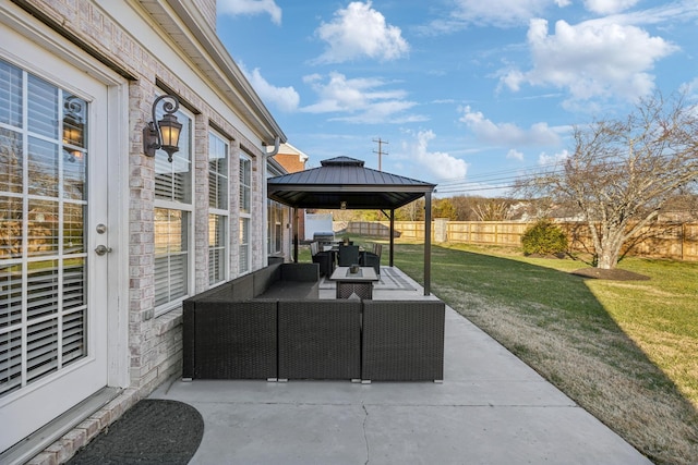 view of patio / terrace with an outdoor living space and a gazebo