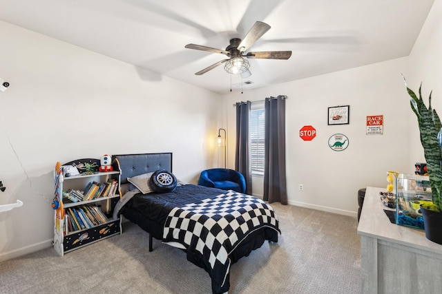 carpeted bedroom with ceiling fan