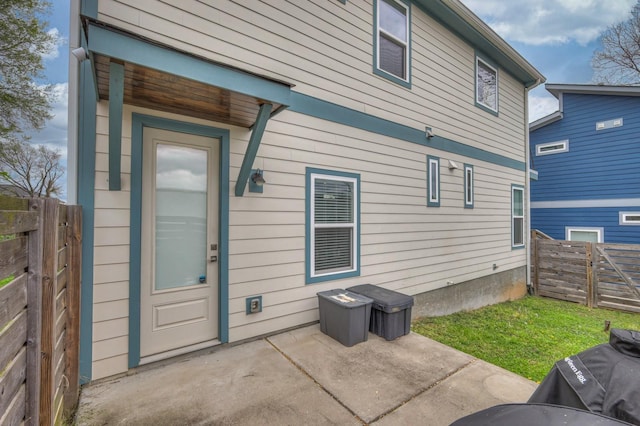 rear view of property featuring a patio