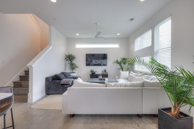 living room featuring ceiling fan