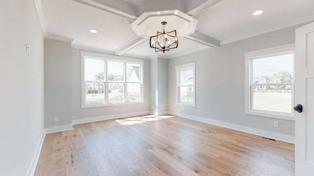 spare room with light wood-type flooring, beam ceiling, a chandelier, and crown molding